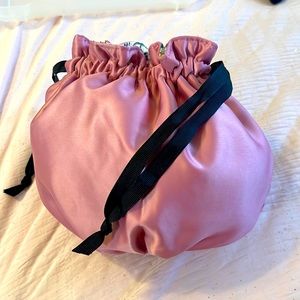 Pink Gucci cosmetic drawstring bag